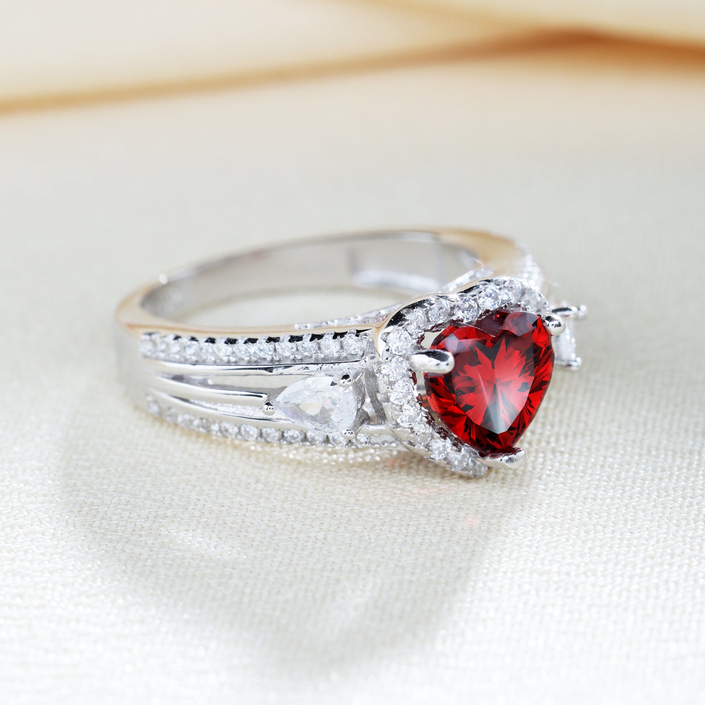Three Stone Halo Heart Cut Sterling Silver Ring