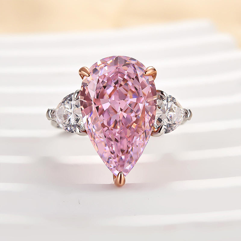 Gorgeous Pear Cut Pink Sapphire Three Stone Engagement Ring