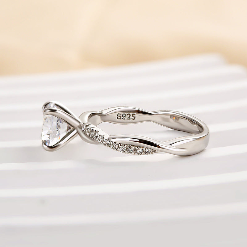 1.25 Carat Twist Round Cut Engagement Ring